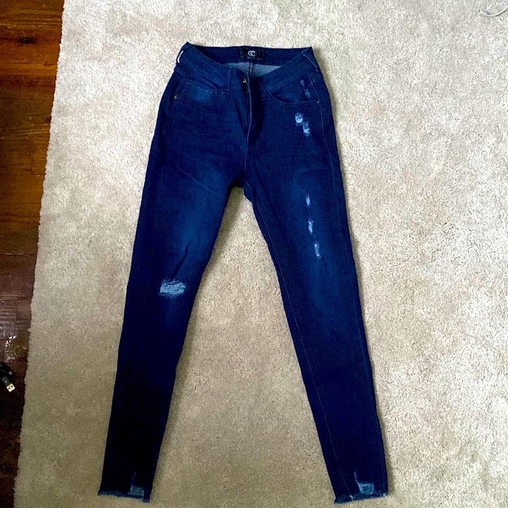 Blue distressed jeans